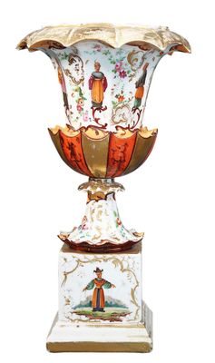 a vase that is sitting on top of a pedestal