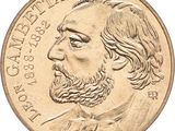 an image of a close up of a coin with a man ' s face