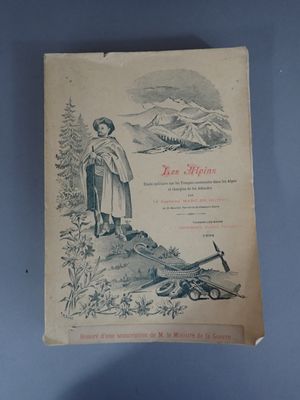 an old book with a picture of a man and a woman on it