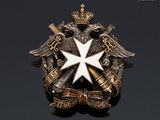 a close up of a badge on a black background