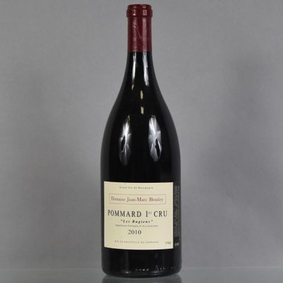 a bottle of wine that is sitting on a table