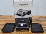 an image of a box of luggage sitting on top of a wooden table