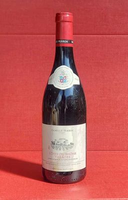 a bottle of wine that is sitting on a table