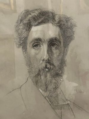 dessin représentant le portrait d'un homme barbu en costume