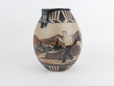 a vase that has a picture of a man and a woman on it