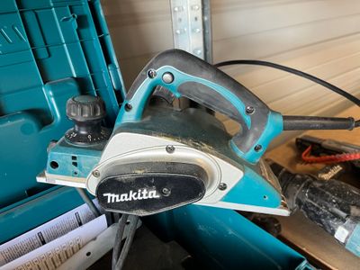 a picture of a makita planer in a workshop