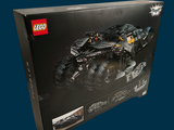 lego batman batmobile set in a box on a blue background