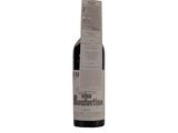 a bottle of wine that is sitting on a table