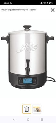 an image of a large stainless steel pot with a digital timer on it