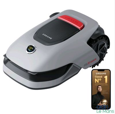 une image représentant une tondeuse robotisée à côté d'un téléphone portable