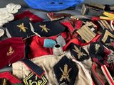 many different types of hats and ties laid out on a table
