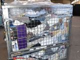 a metal cart filled with lots of items inside of a building