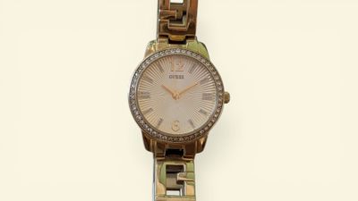 an image of a woman ' s watch on a white background