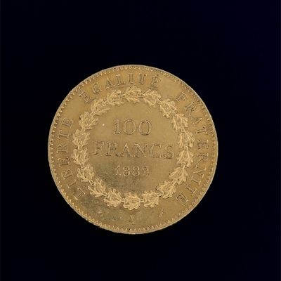 une image représentant une pièce d'or surmontée d'une couronne