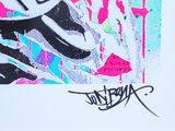 a painting of a skateboarder riding a skateboard on a wall
