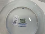 two plates that are sitting on a table