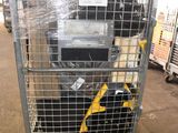 a metal cart with a bunch of electronics on top of it