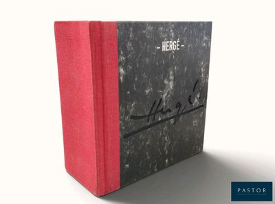 an image of a book with a red cover sitting on a white surface