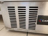 a close up of a metal box with a logo on it