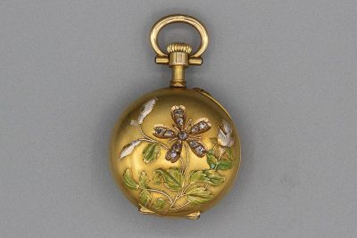 Montre de col en or émaillé à décor de fleur sertie de diamants. P 14g - Photo 1