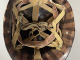 an image of a helmet with straps and a helmet on top of it