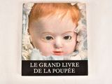 a picture of a book with a picture of a baby