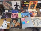 a lot of records on a table in a store