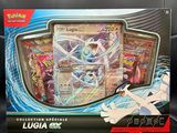 the box of the pokemon card game is open and ready to be played