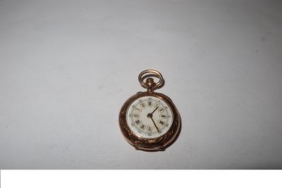 an image of a pocket watch on a white surface