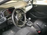 the interior of a car with a steering wheel and dashboard