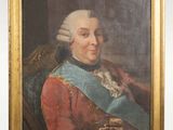 portrait of a gentleman in a red coat and blue sash