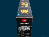 a box of lego technics on a blue background