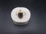 an image of a ring with a blue stone inside of it