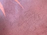 a brown book with writing on it sitting on a table