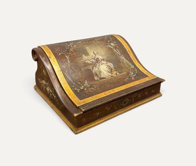une vieille boîte en bois sur laquelle est peinte une image sur un fond blanc