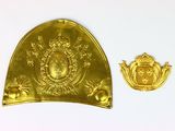 deux pièces d'or sont représentées sur un fond blanc