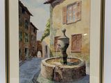 painting of a water fountain in front of a building with shutters on the windows
