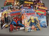 a lot of comic books sitting on a table