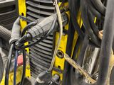 a lot of wires that are connected to a machine