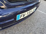 a close up of a car with a license plate on it