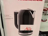 emballage d'une cafetière noir et blanc exposée dans un magasin