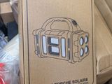 a cardboard box with a picture of a camera inside of it