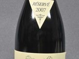 a bottle of wine that is sitting on a table