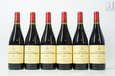 six bottles of red wine lined up in a row
