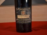 a bottle of wine that is sitting on a table