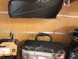 many different types of helmets on display in a store