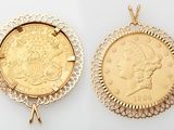 two gold coin pendants with a woman ' s head and a man ' s head