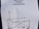 a sign with a drawing of a campervan on it