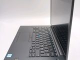a laptop computer that is sitting on a table