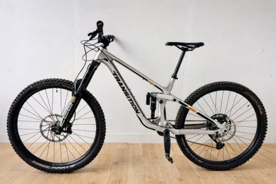 a bike that is sitting on a hard wood floor